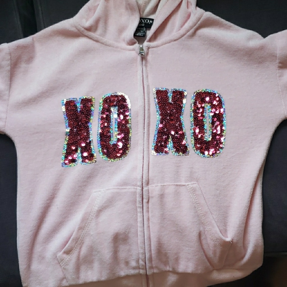 A girls sweater/hoodie